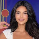 Who Is Holly Scarfone? The $69,000 Kiss, The Scott Disick Saga, and What She's Actually Building